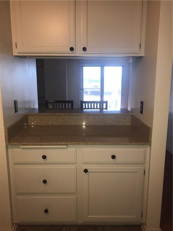 Kitchen opens up to the living area, lots of cabin