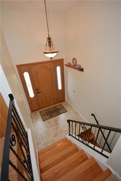 The open and airy foyer offers easy-care laminate 