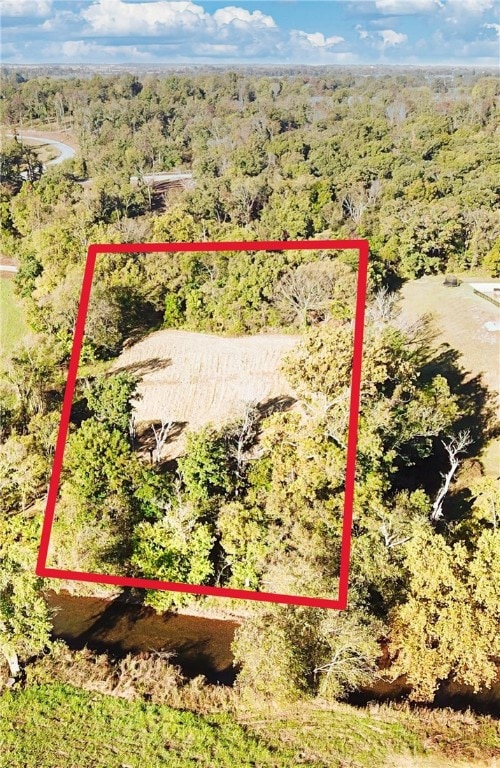 The land backs up to the Osage Creek. The area right along the creek is in a flood zone. The red border is not exact and just for an approximate idea of the land boundaries.