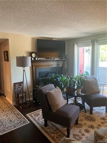 Beautiful wood burning fireplace in living room.