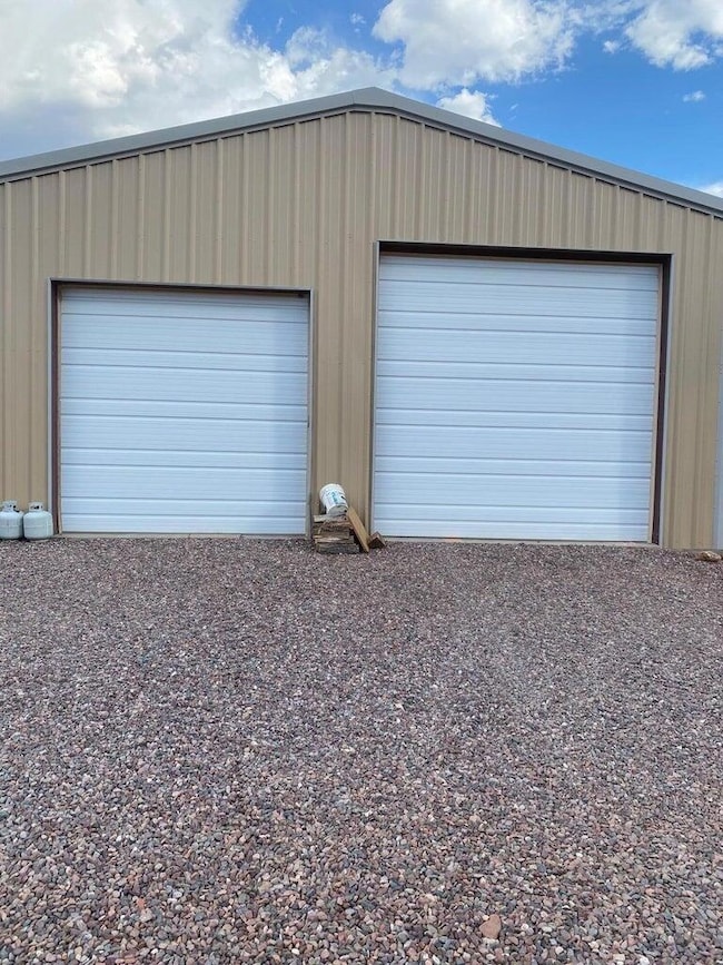 Garage w/ 10 & 12 ft doors
