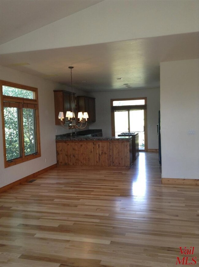 Dinning area and Kitchen with new wood f