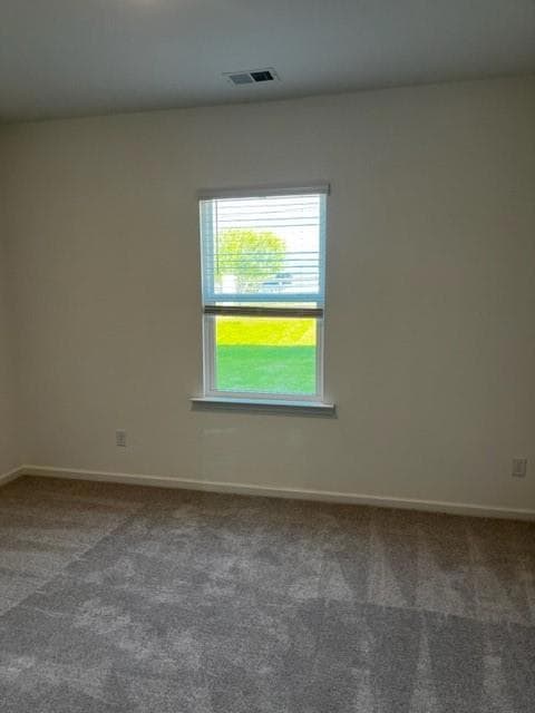 Empty room featuring carpet floors