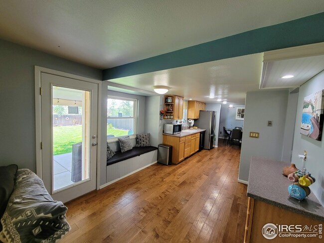 Very open kitchen opening to beautiful backyard.