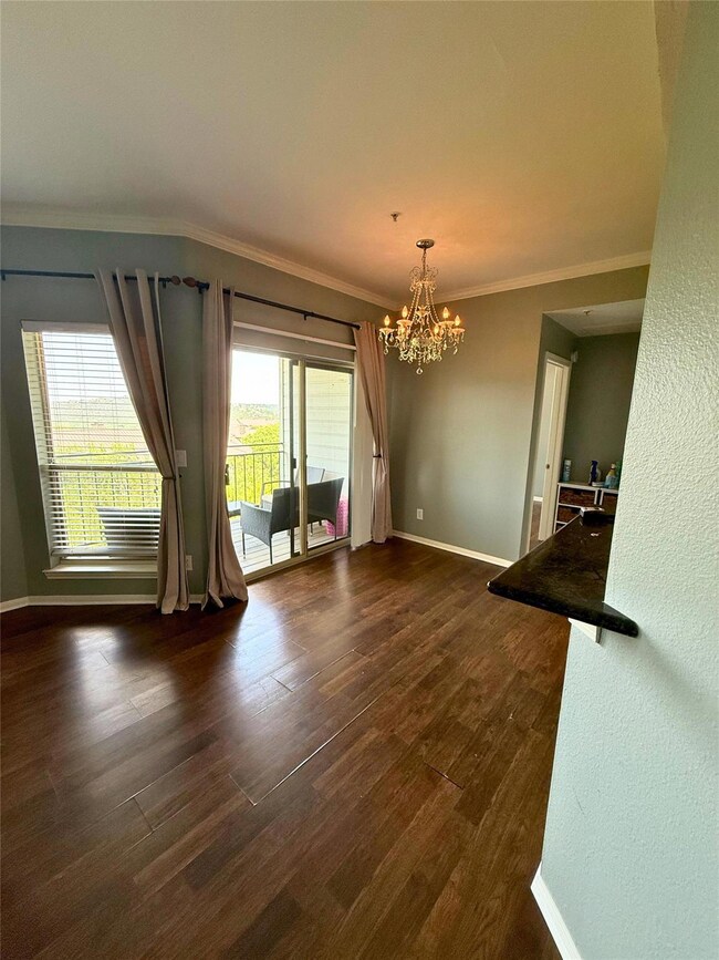 Unfurnished dining area featuring a chandelier, c