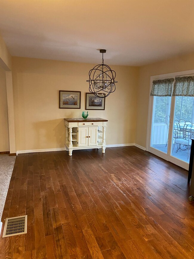 Dining area with family room to the left and the p