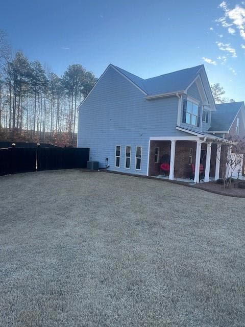 View of home's exterior featuring cooling unit