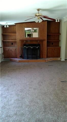 Great room with fireplace and built-ins.