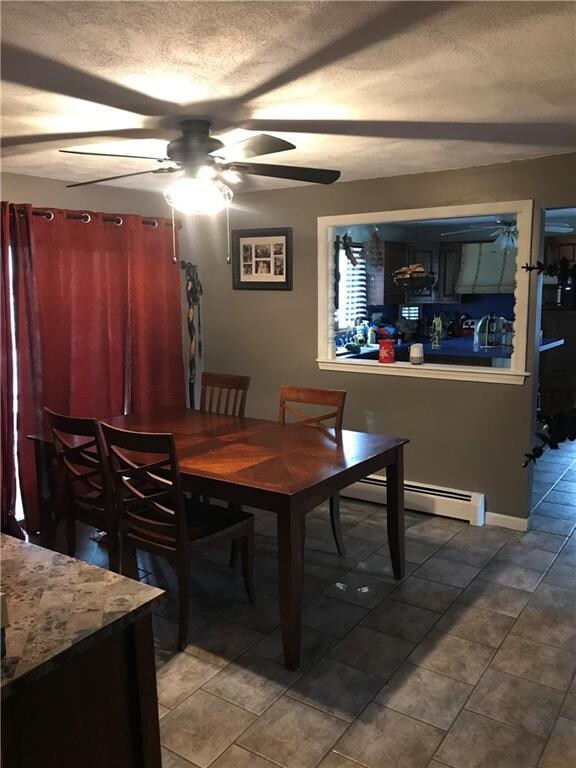 Dining room, same tile flooring as kitchen...view