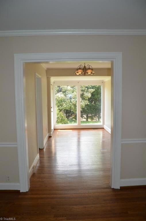 Notice the finishes! Lovely chair rail and crown moulding add character and finishing touches to the space.