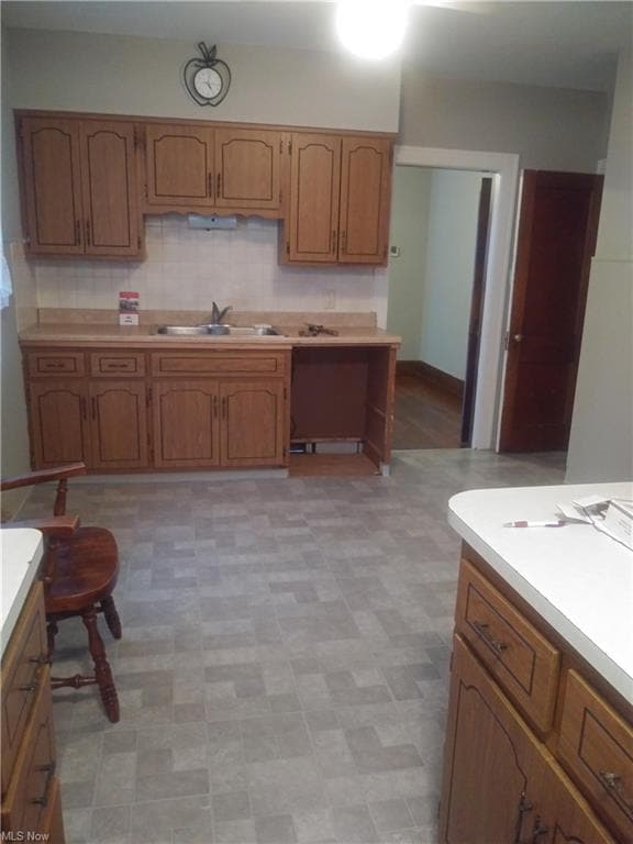 The spacious kitchen is having a brand new dishwasher installed.