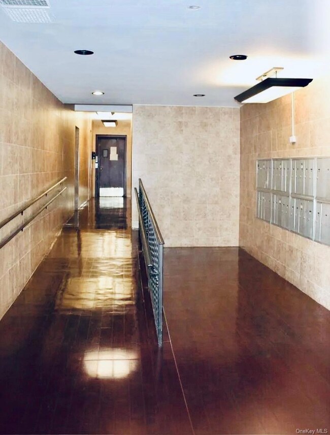 8740 Francis Lewis Blvd unit A-25, Queens Village, NY 11427 - photo 2