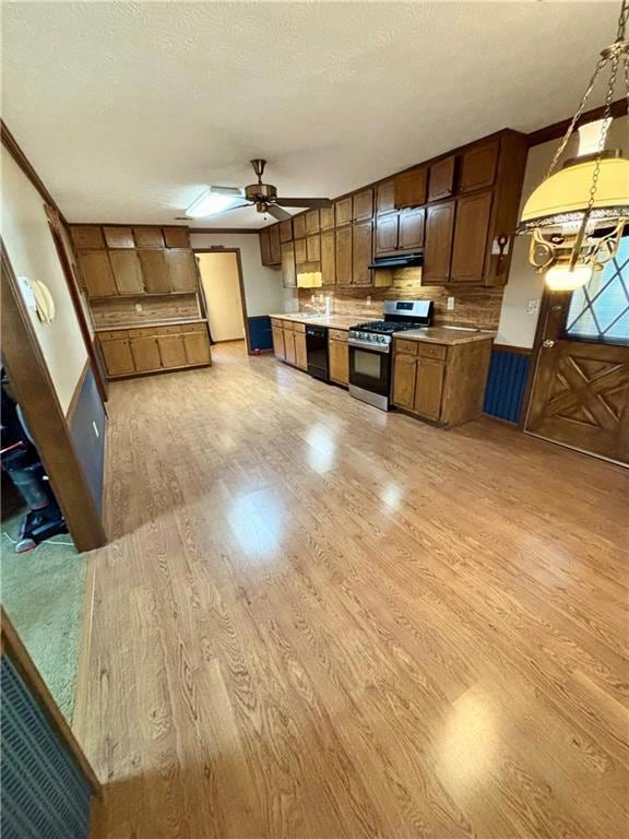 Kitchen featuring stainless steel range with gas cooktop.