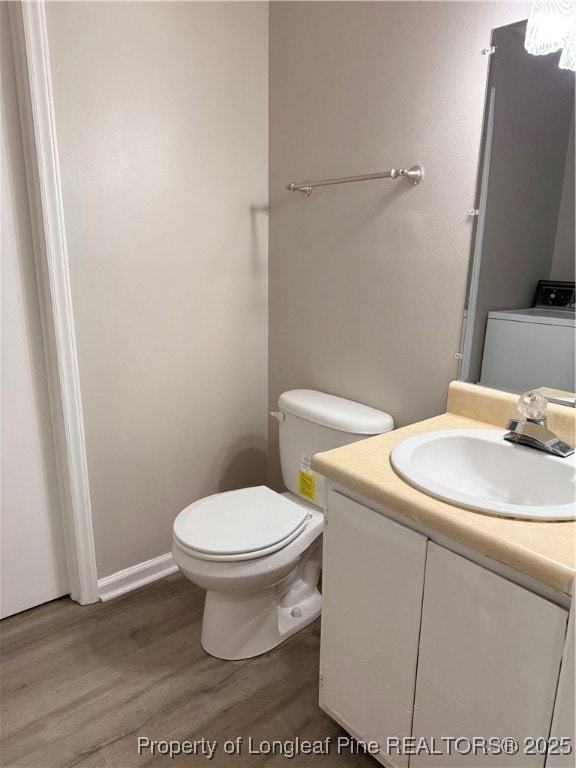 Hall half bath with laundry area