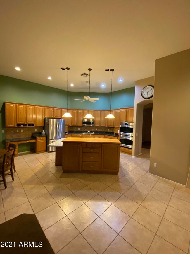 Kitchen opens to large Family Room with