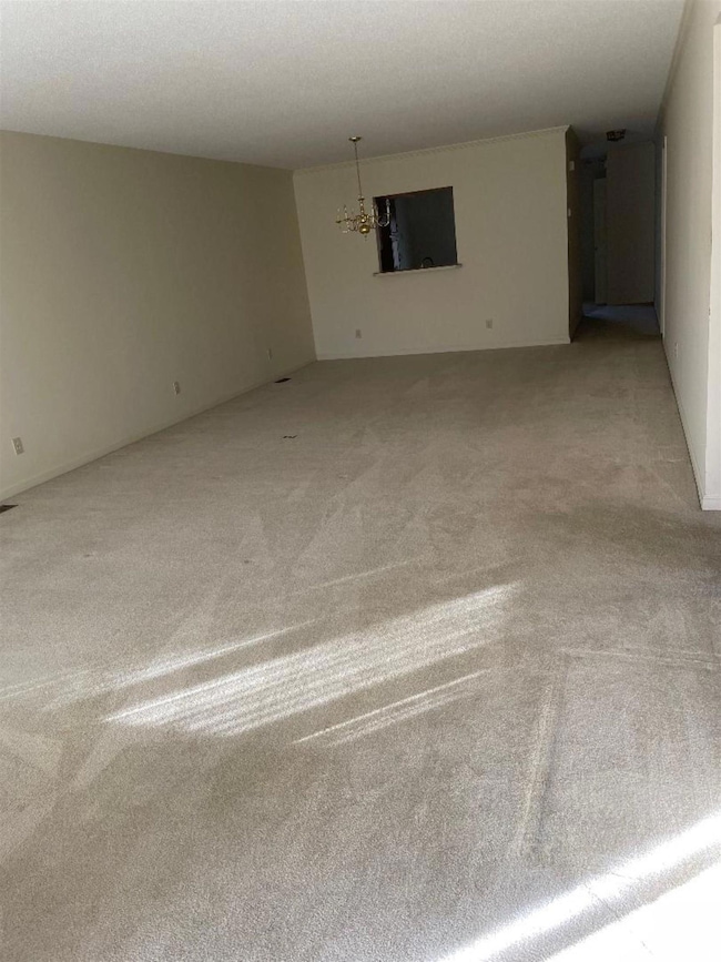 SPACIOUS LIVING ROOM THAT ALLOWS ROOM FOR A FULL F