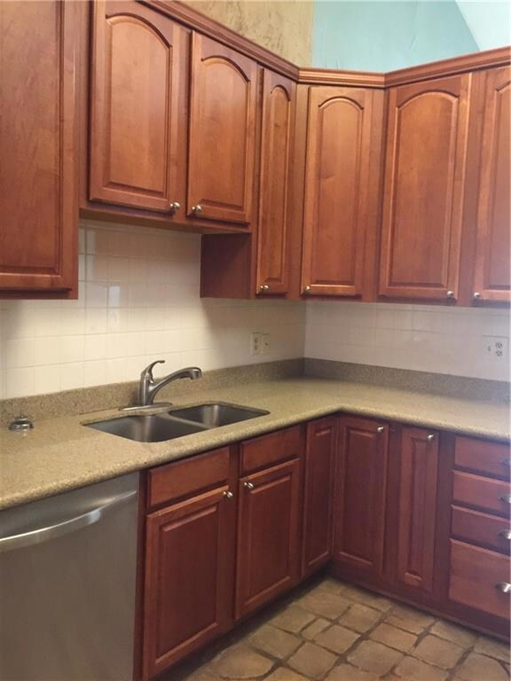 Kitchen with stainless steel appliances