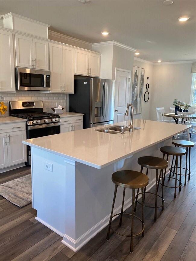 Photos of Model home of Mitchell plan.