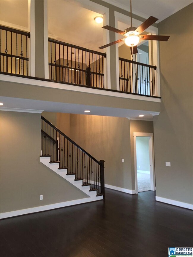 Elegant Staircase and Boardwalk with iron spindles