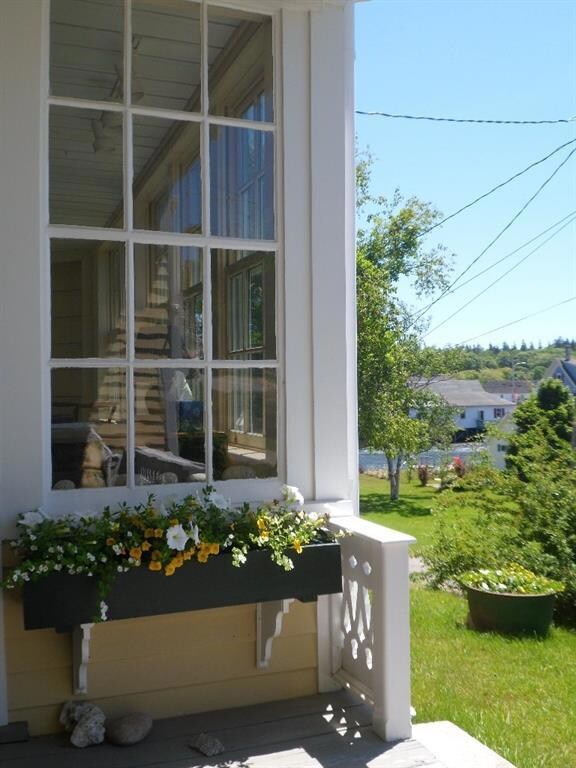 Original covered porch on south side...