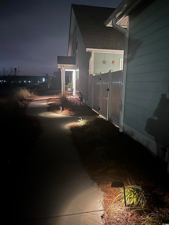 View of property exterior at twilight