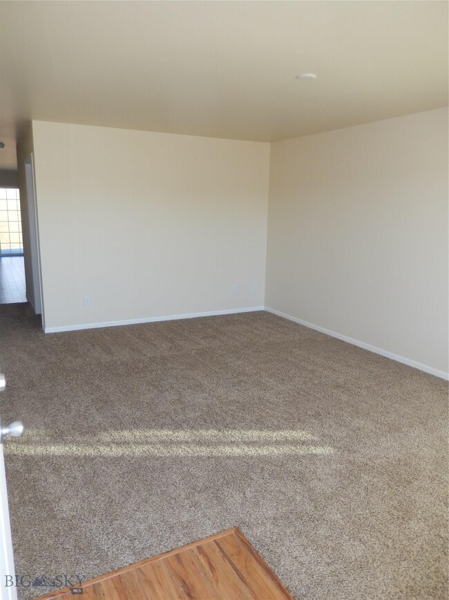 Living room. Photo of similar home.