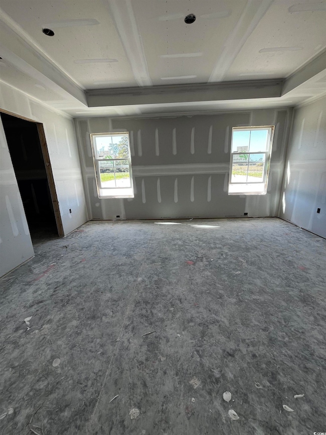 Empty room featuring healthy amount of natural light