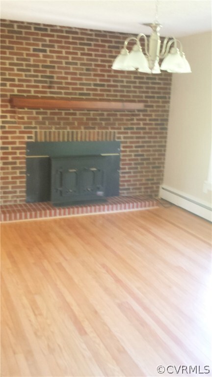 Huge Living room with refinished hardwoods and woo