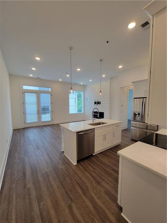 Kitchen featuring sink, hanging light fixtures, st