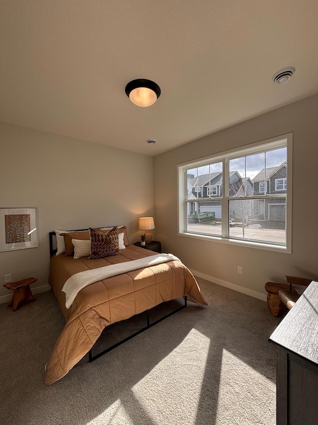 The second bedroom is thoughtfully positioned at the front of the home, offering added privacy from the main living areas.