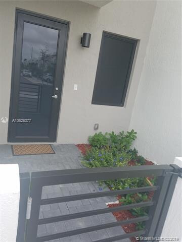 Little flower garden at the entrance of the house