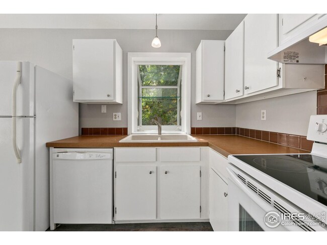 Recently painted cabinets. All kitchen appliances included.