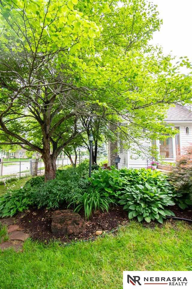 The lawn spaces are large and inviting.  Much of the yard brags shade. Mature perennials mean you will enjoy flowers, greenery and ferns each year with no added effort.