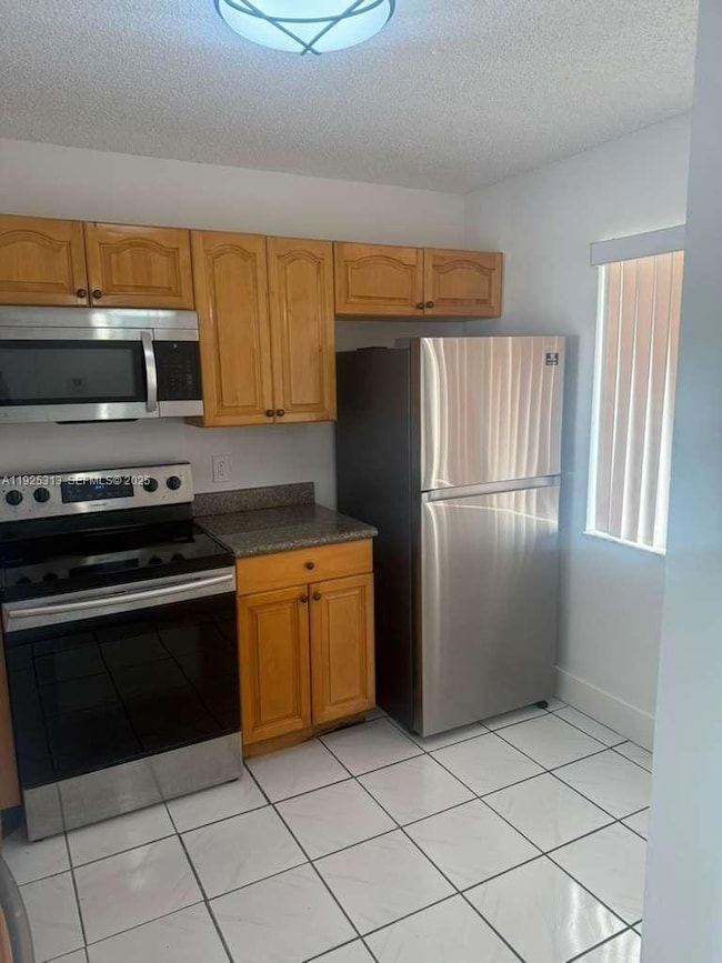 8700 N Sherman Cir unit 503, Miramar, FL 33025 - photo 2