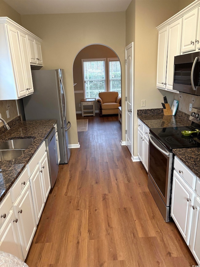 Kitchen with appliances with stainless steel finis