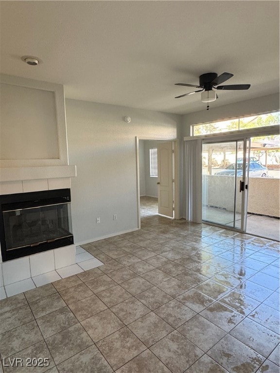 Unfurnished living room with baseboards, a ceiling