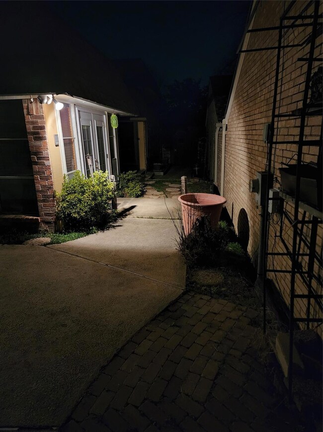 View of property exterior at night