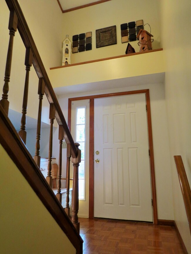 Foyer with plant ledge