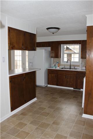 Nice Kitchen and dining area with New Appliances,New Countertop, New Windows in 2004 New Paint,  All New flooring throughout the house.