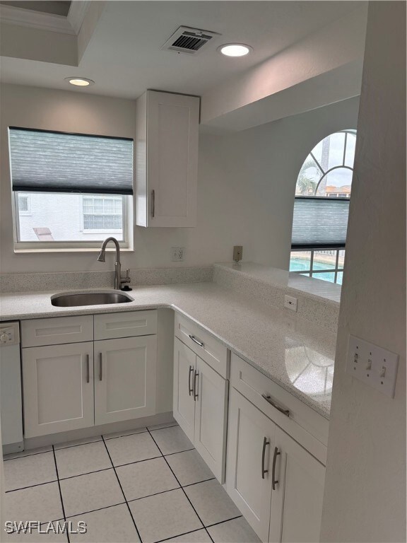 New wood cabinetry and white diamond Quartz counte