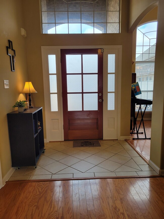 Entryway with wood-type flooring