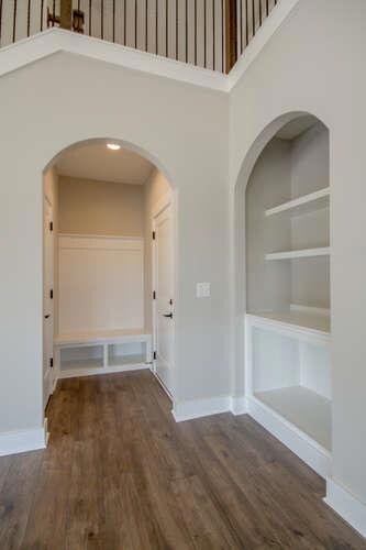 Built in Book case, and drop off zone. 