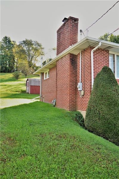Side of Home Looking in back yard.
