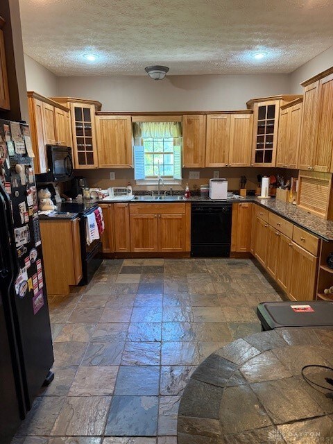 Kitchen with slate floor.  All appliances stay.