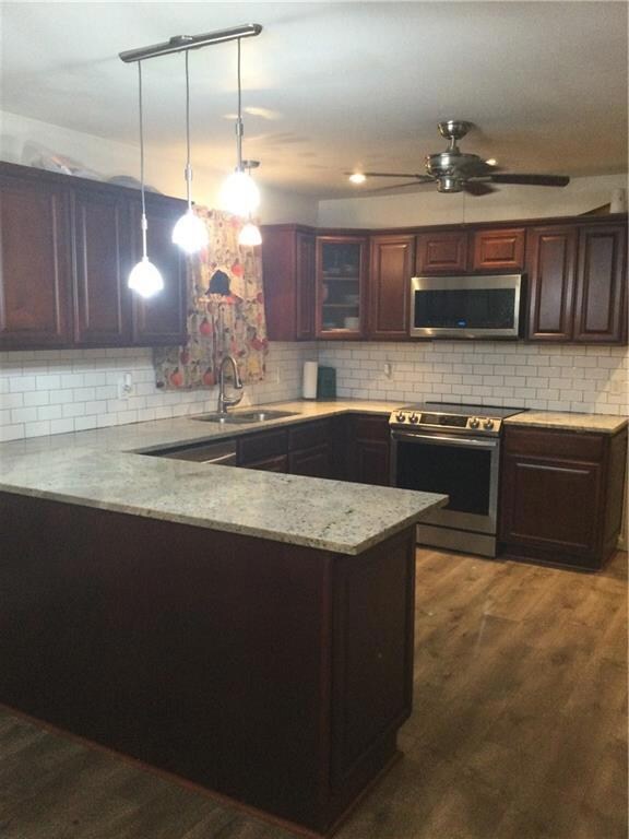 Eat in with breakfast area.
Kitchen with cherry w