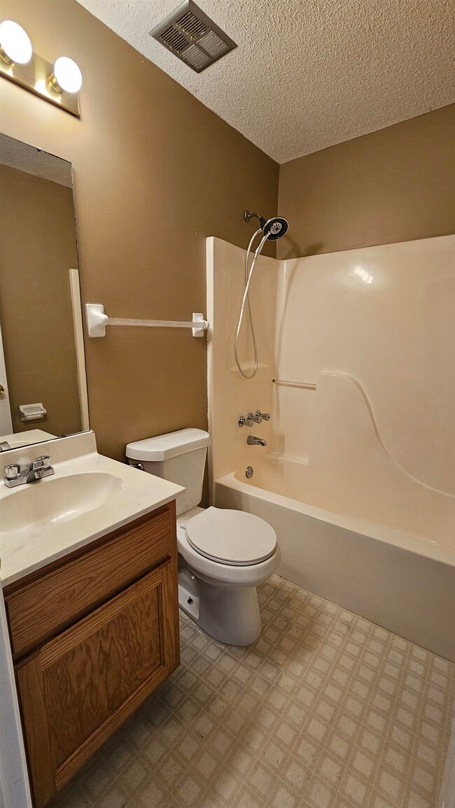 Full bathroom with shower / bathing tub combinatio