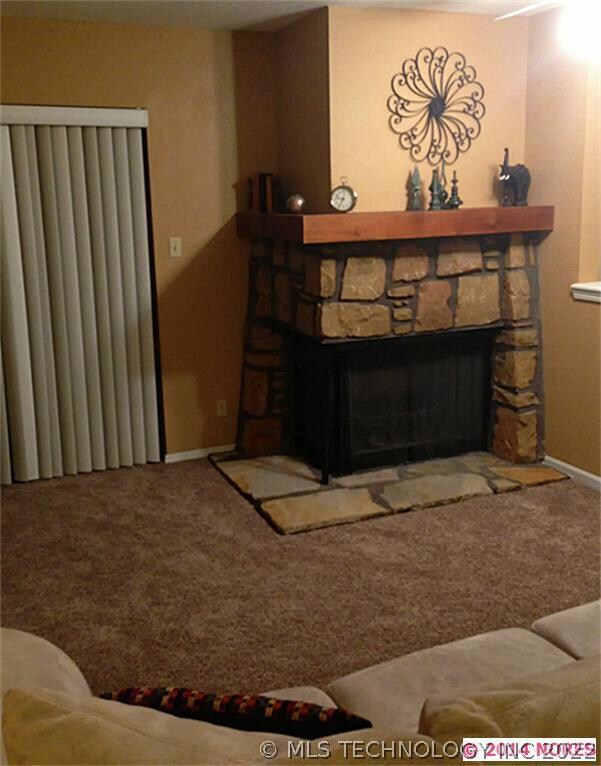 Living room has woodburning fireplace!