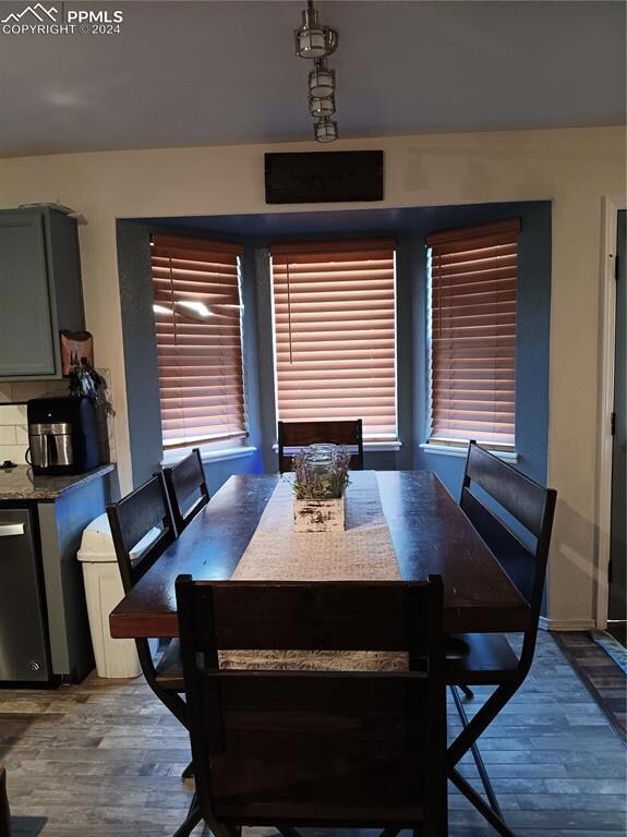 Dining room featuring a healthy amount of sunlight