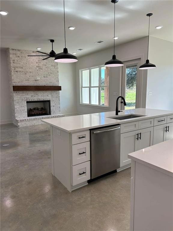 This photo is an excellent example of the open design for this build. The kitchen is designed to face the living room with a perfect view of the fireplace.