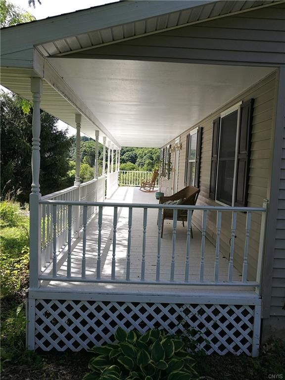 Imagine relaxing on this spacious, extra wide porc